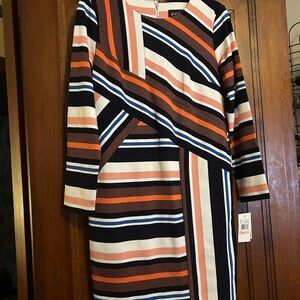 ECI Black and White Long Sleeve Asymmetrical Sheath Dress